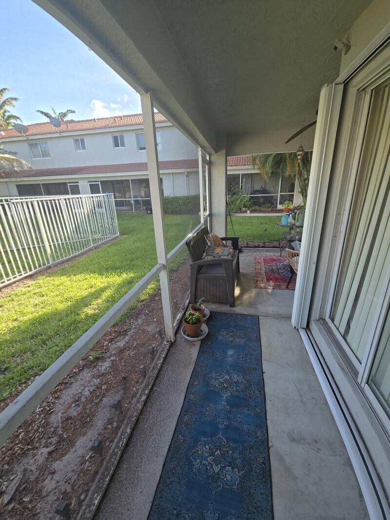 6511 Sandy Bank Terrace Riviera Beach, FL 33407 - Photo 6 of 12 a view of deck with patio