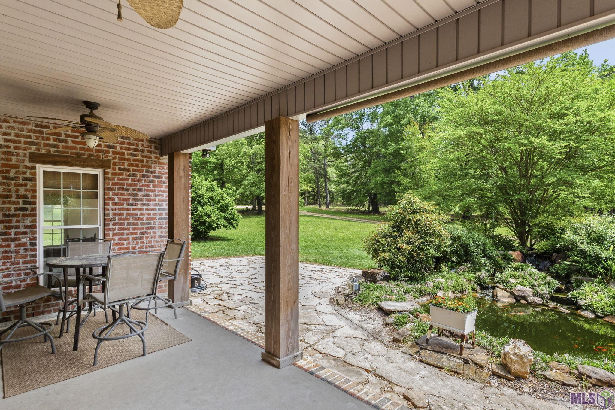 11257 Rist Road Clinton, LA 70722 - Photo 19 of 22 Back door entrance and porch