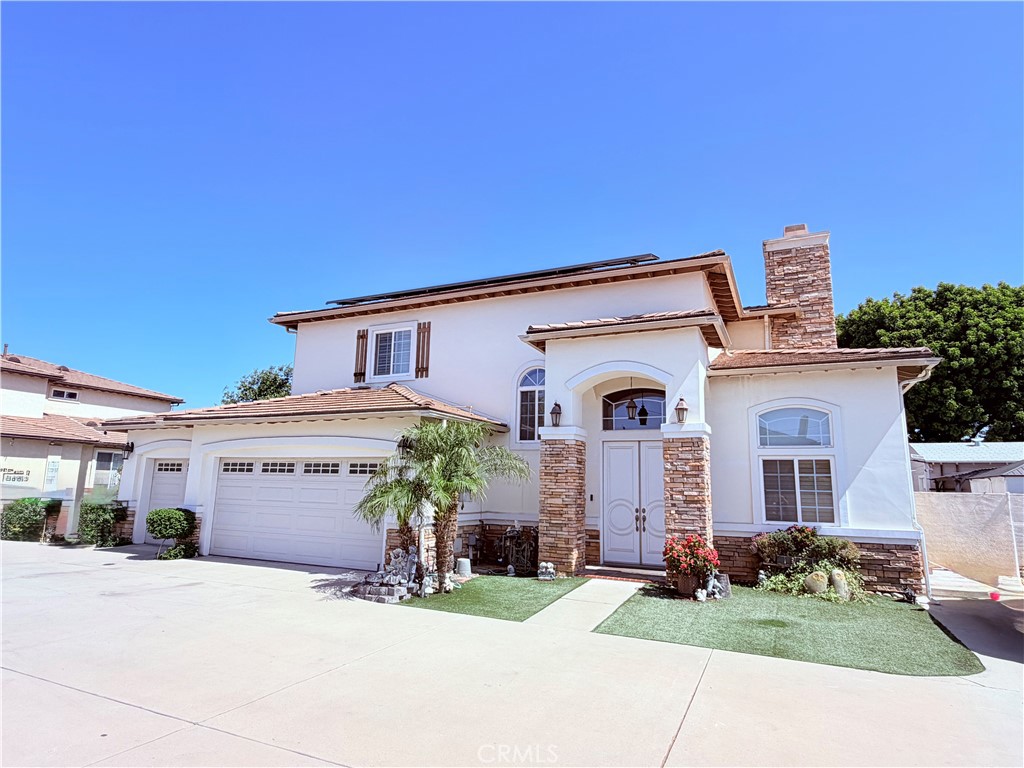 5215 Buffington Road El Monte, CA 91732 - Photo 1 of 1 front view of a house with a yard