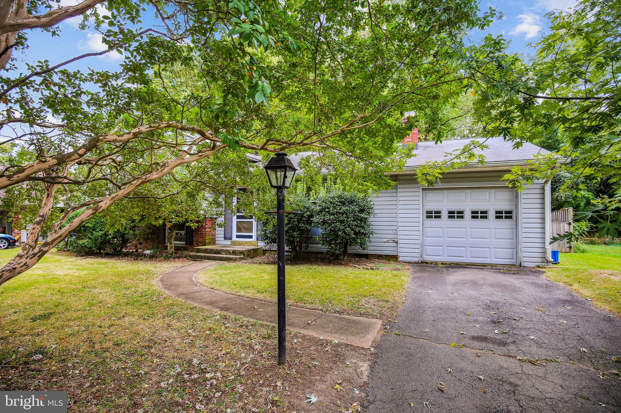 7708 Hayfield Road Alexandria, VA 22315 - Photo 2 of 10 Front/Driveway/Garage