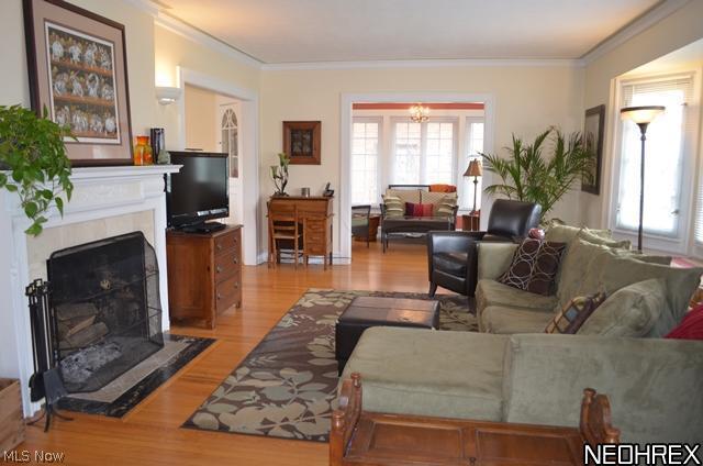 3290 Stockholm Road Cleveland, OH 44120 - Photo 3 of 16 Another view of the large light filled living room which opens to the family room.
