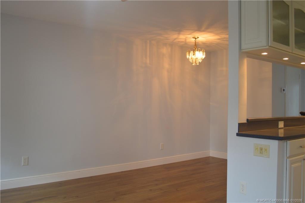 2600 Southeast Ocean Boulevard, Unit E4 Stuart, FL 34996 - Photo 11 of 47 a view of a room with wooden floor