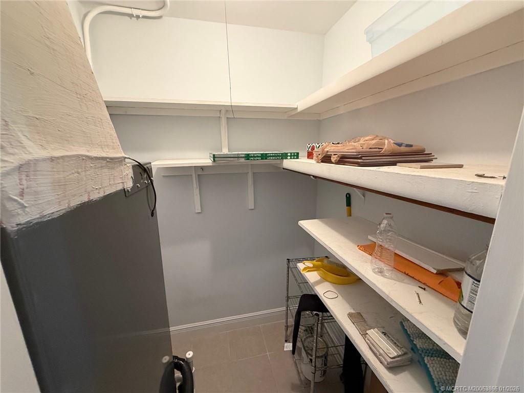 2600 Southeast Ocean Boulevard, Unit E4 Stuart, FL 34996 - Photo 25 of 47 a room with storage and utility
