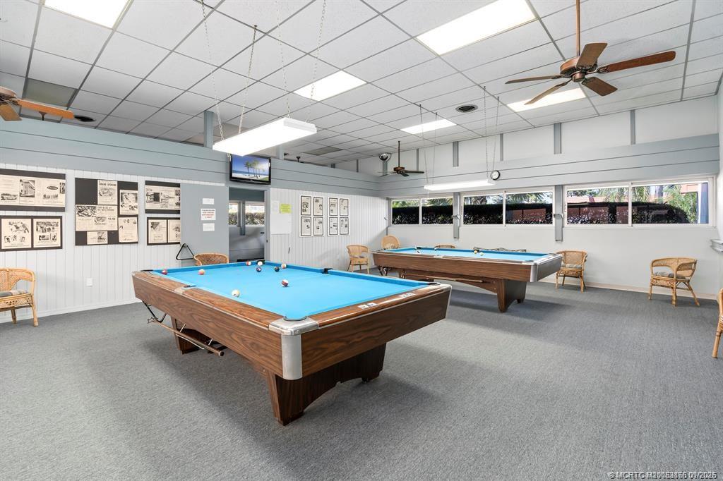 2600 Southeast Ocean Boulevard, Unit E4 Stuart, FL 34996 - Photo 40 of 47 a living room with furniture pool table and a window
