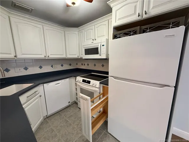 a view of room with window and hardwood floor