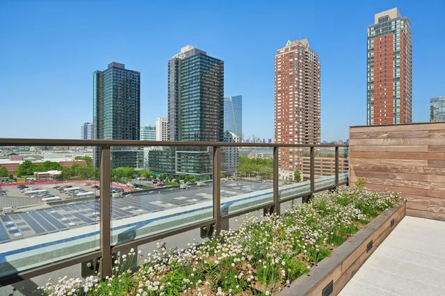 a view of a city with tall buildings