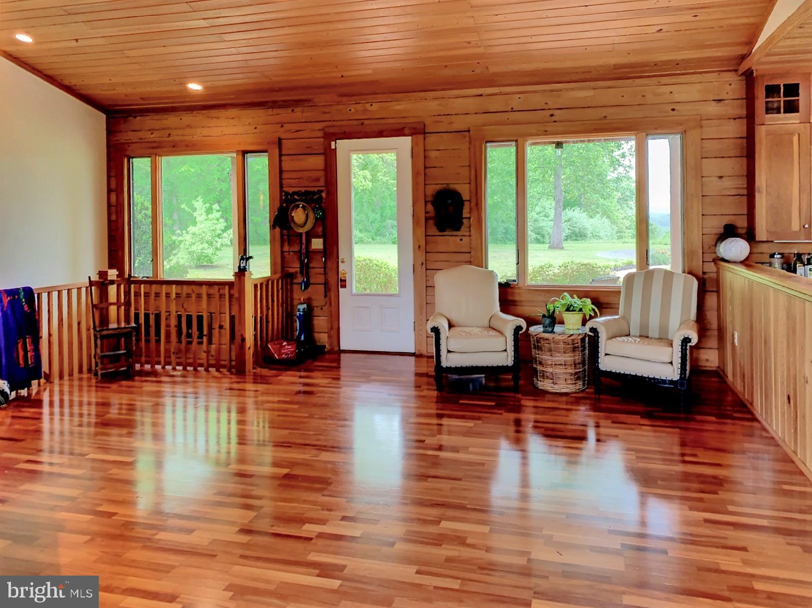 9626 Sherburne Farm Road Marshall, VA 20115 - Photo 16 of 57 a living room with furniture and wooden floor