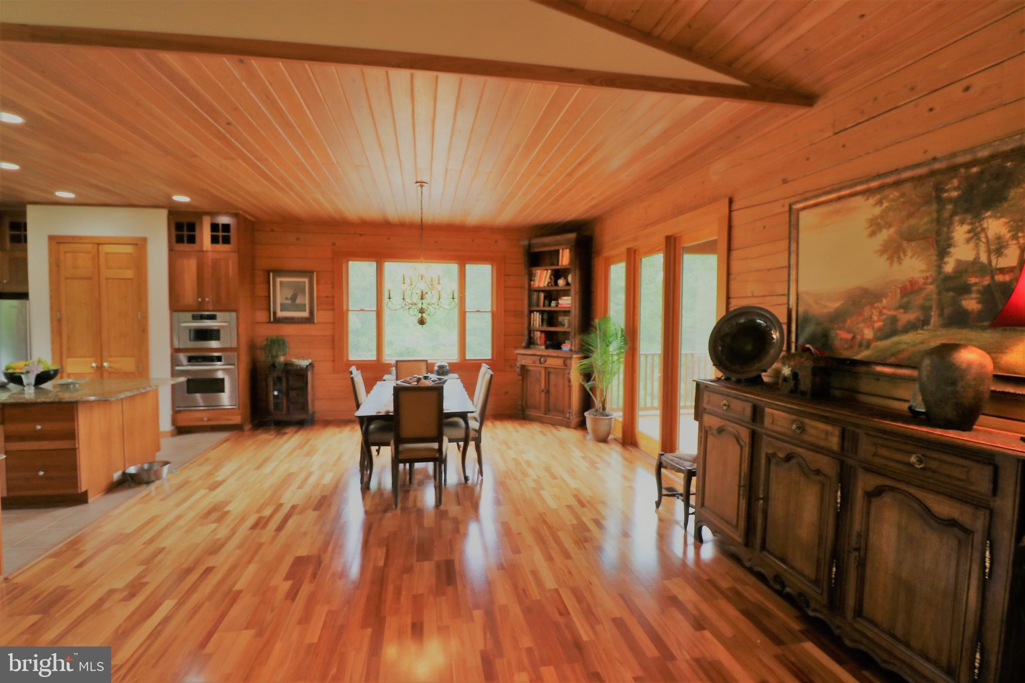 9626 Sherburne Farm Road Marshall, VA 20115 - Photo 25 of 57 a view of a dining room with furniture window and wooden floor