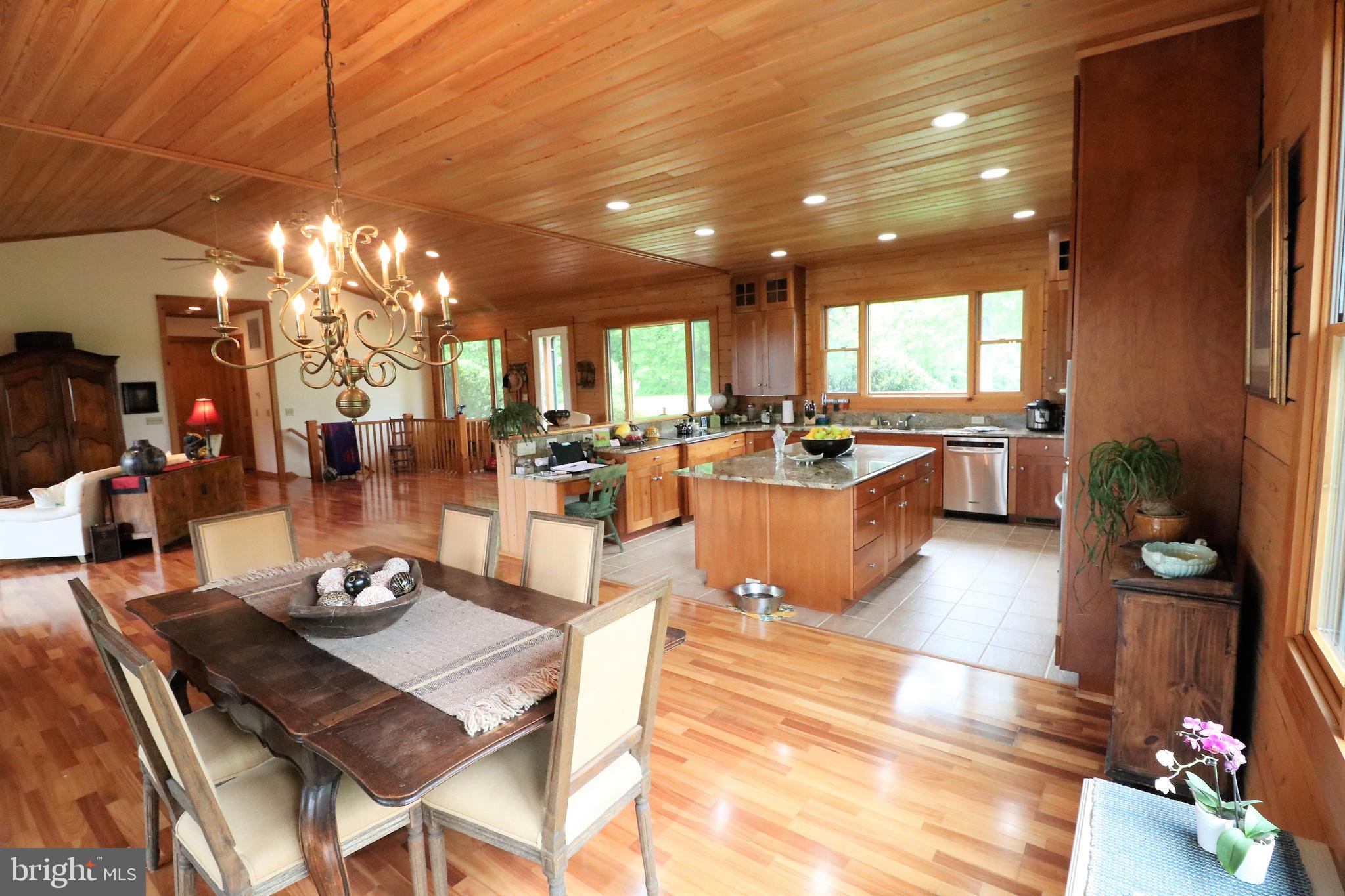9626 Sherburne Farm Road Marshall, VA 20115 - Photo 27 of 57 a view of a dining area with furniture window and wooden floor