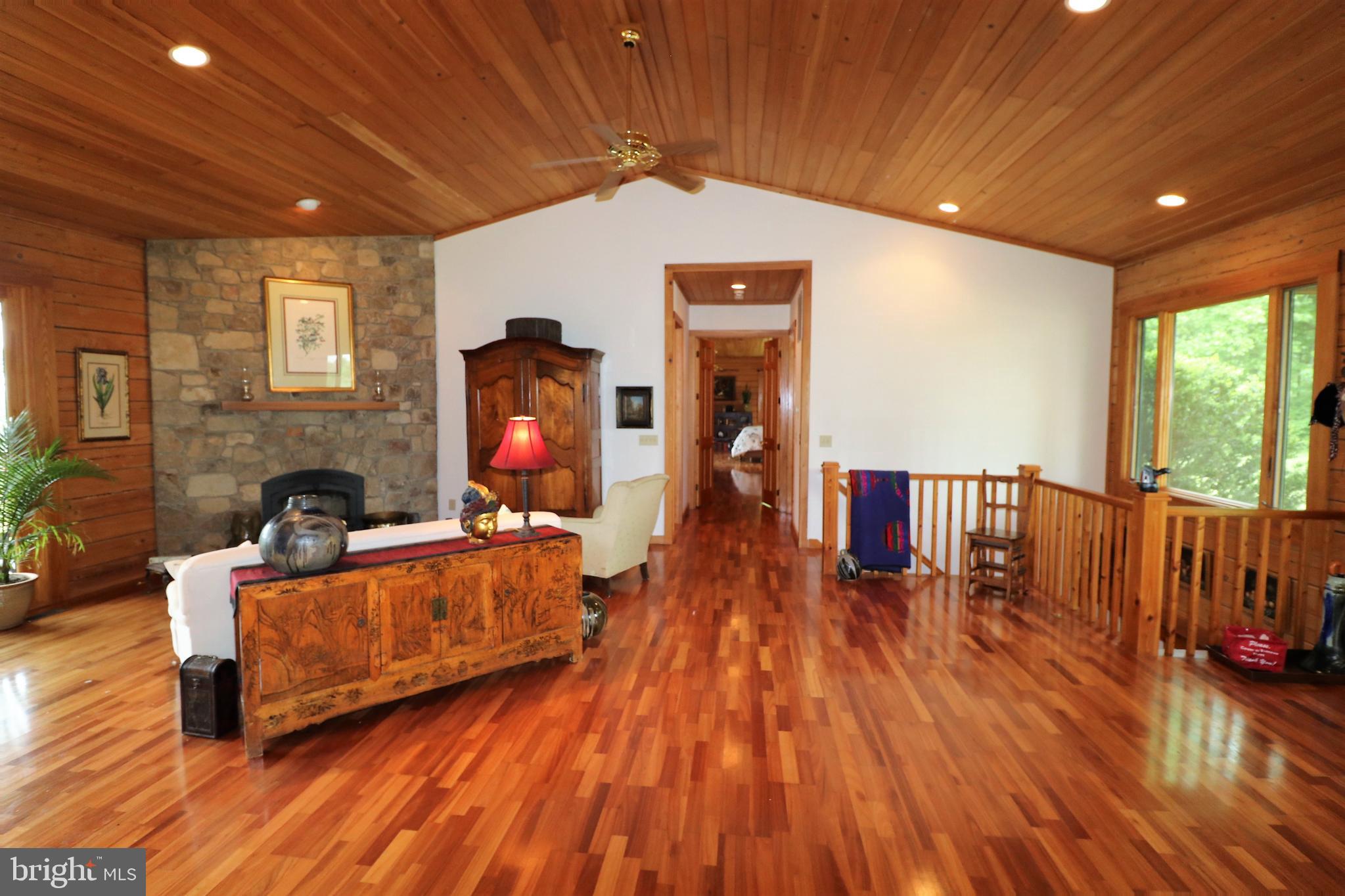 9626 Sherburne Farm Road Marshall, VA 20115 - Photo 29 of 57 a living room with furniture and a flat screen tv