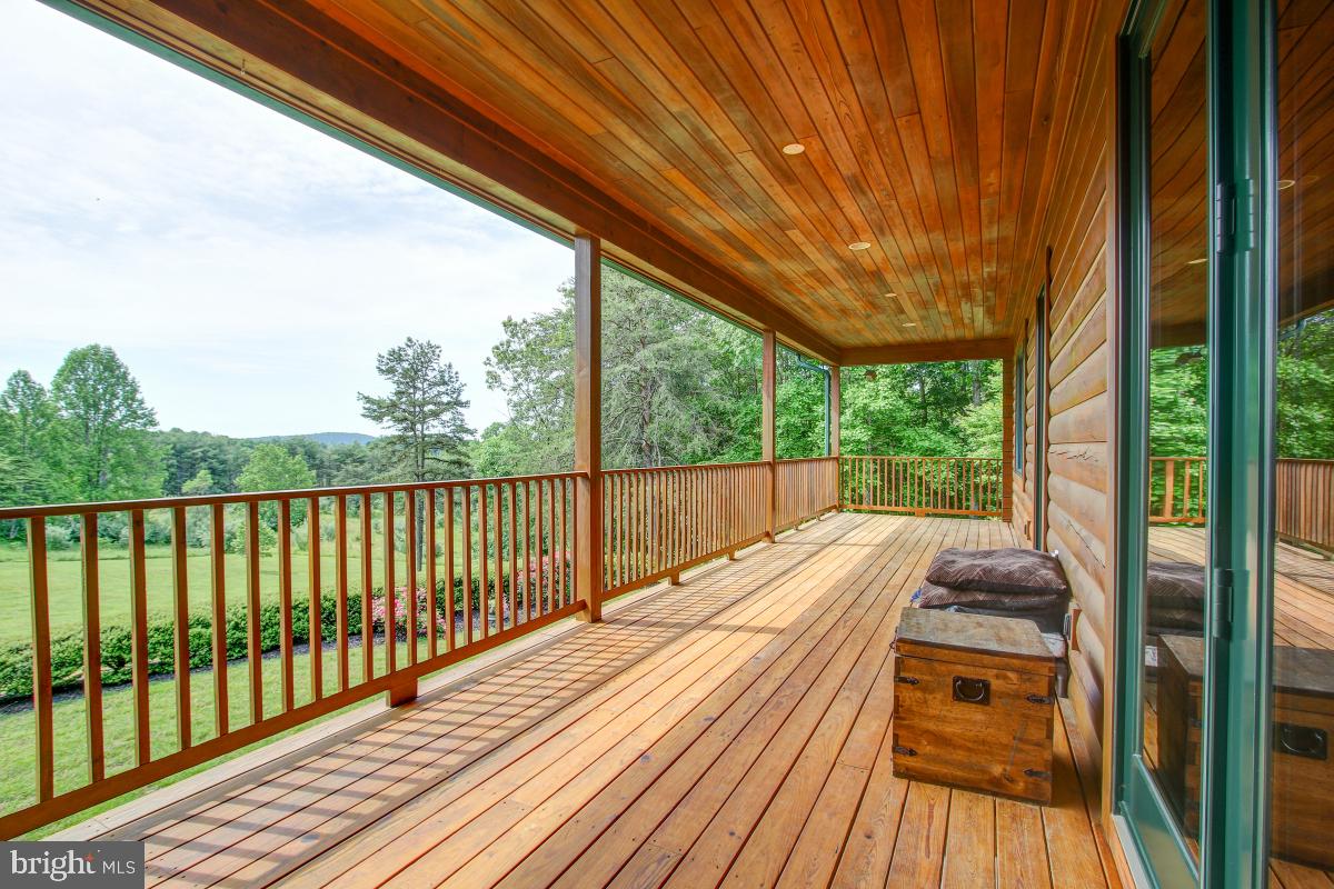 9626 Sherburne Farm Road Marshall, VA 20115 - Photo 31 of 57 a view of balcony with wooden floor