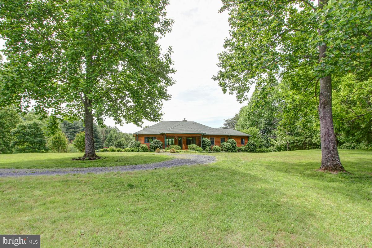 9626 Sherburne Farm Road Marshall, VA 20115 - Photo 44 of 57 a view of a park with large trees and a lots of bushes