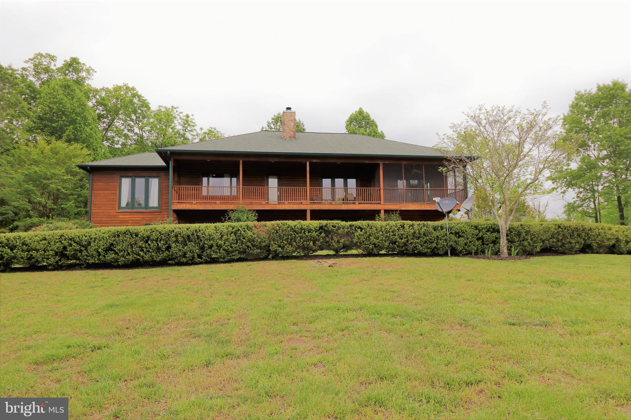 9626 Sherburne Farm Road Marshall, VA 20115 - Photo 47 of 57 a front view of a house with garden