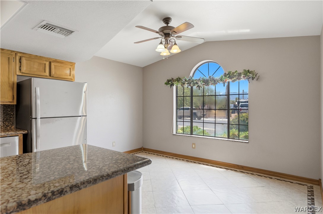 2719 Ricca Court Kingman, AZ 86401 - Photo 7 of 33 a view of a kitchen with a sink and a window