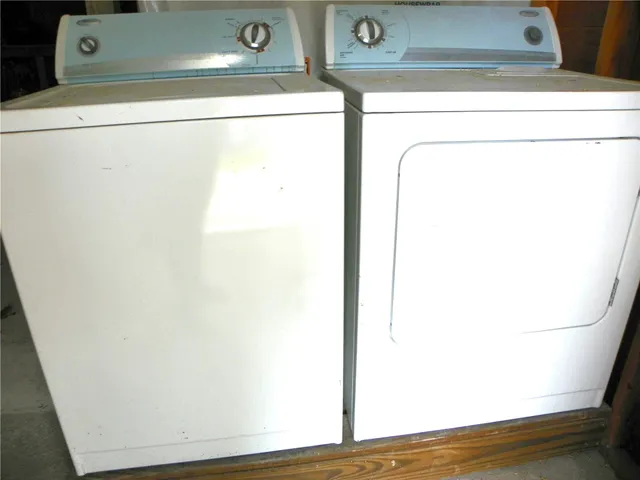 a close up view of washer and dryer