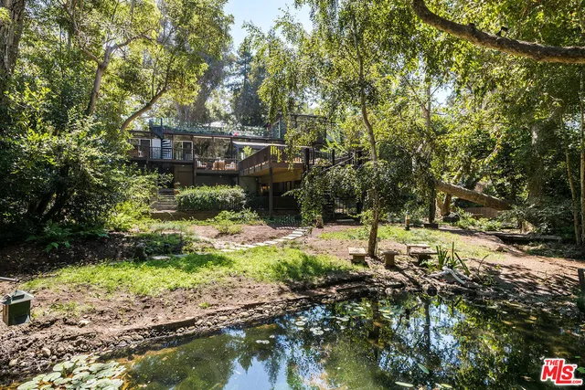 a outdoor space with chairs and wooden floor