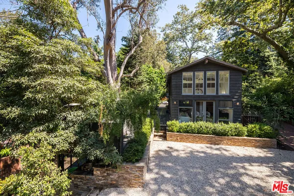 a view of a balcony with wooden floor