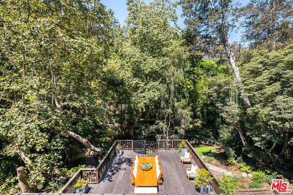 a work room with furniture and a window