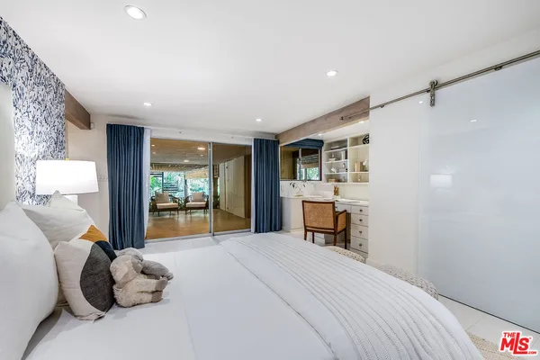 a view of balcony with wooden floor