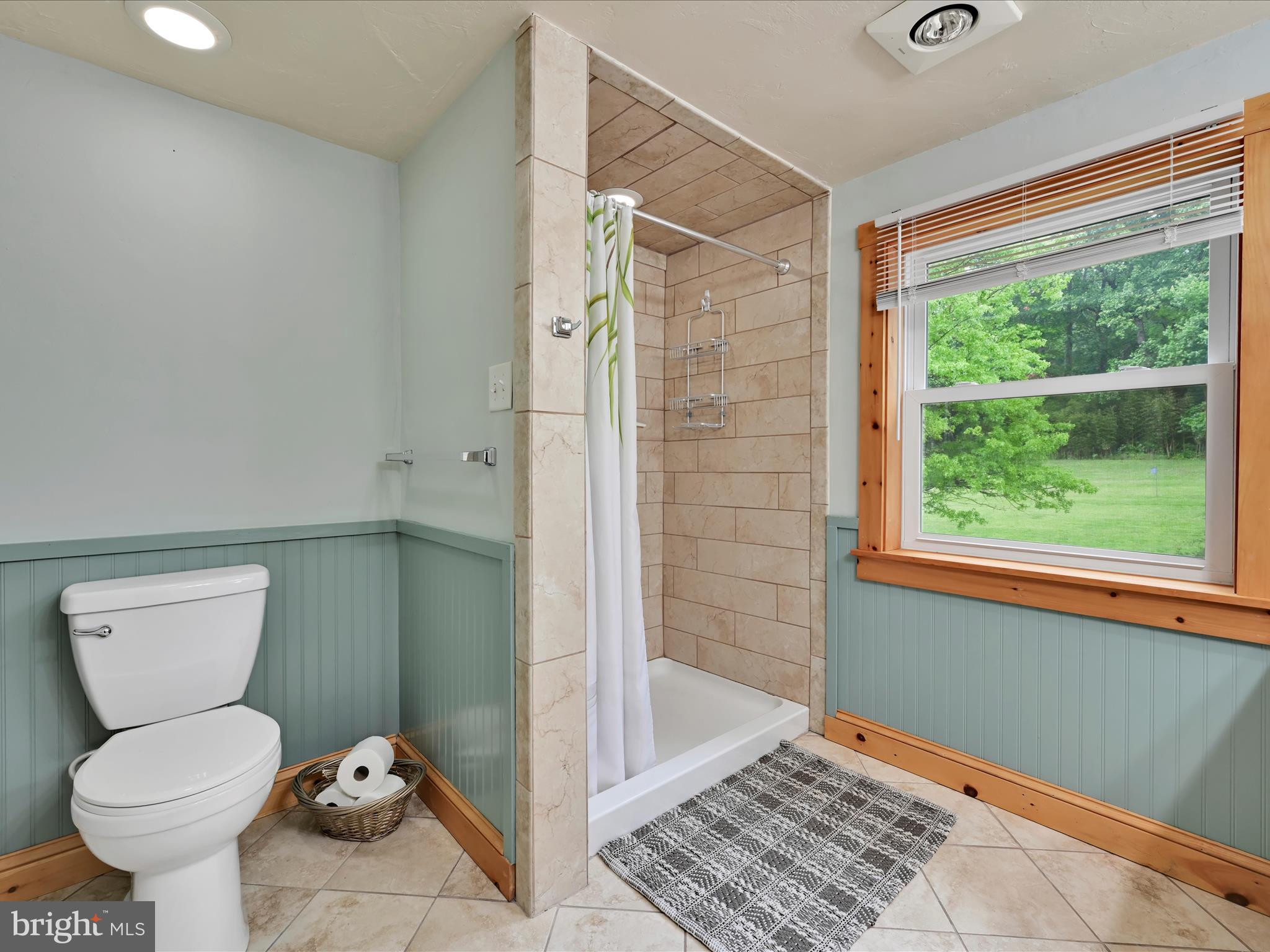 1553 St Peters Road Pottstown, PA 19465 - Photo 18 of 33 a bathroom with a toilet and a shower
