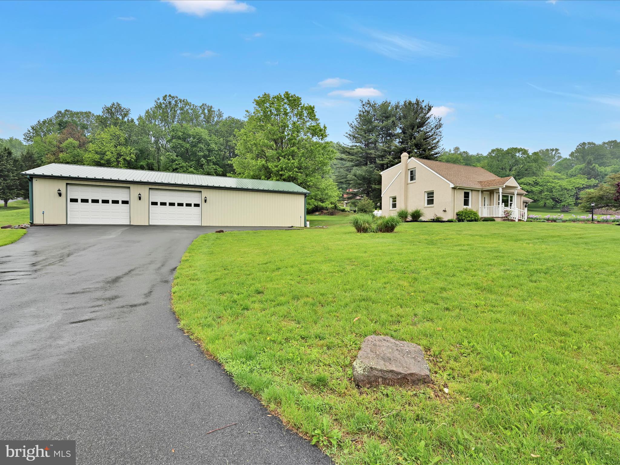 1553 St Peters Road Pottstown, PA 19465 - Photo 23 of 33 a white house with green field in front of it