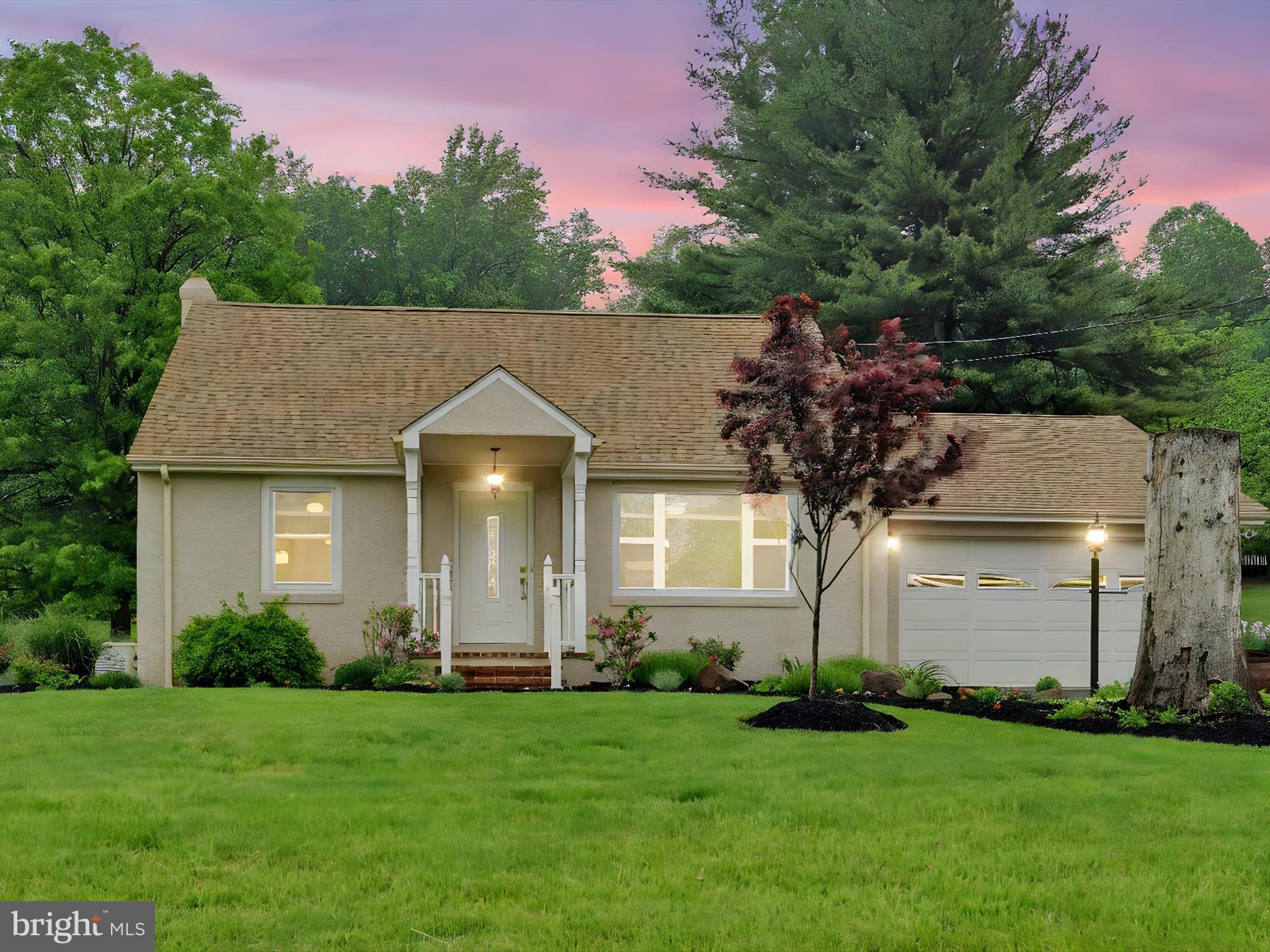 1553 St Peters Road Pottstown, PA 19465 - Photo 28 of 33 a front view of a house with a garden and plants