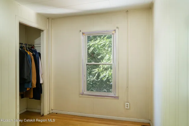 a view of a room that has a window