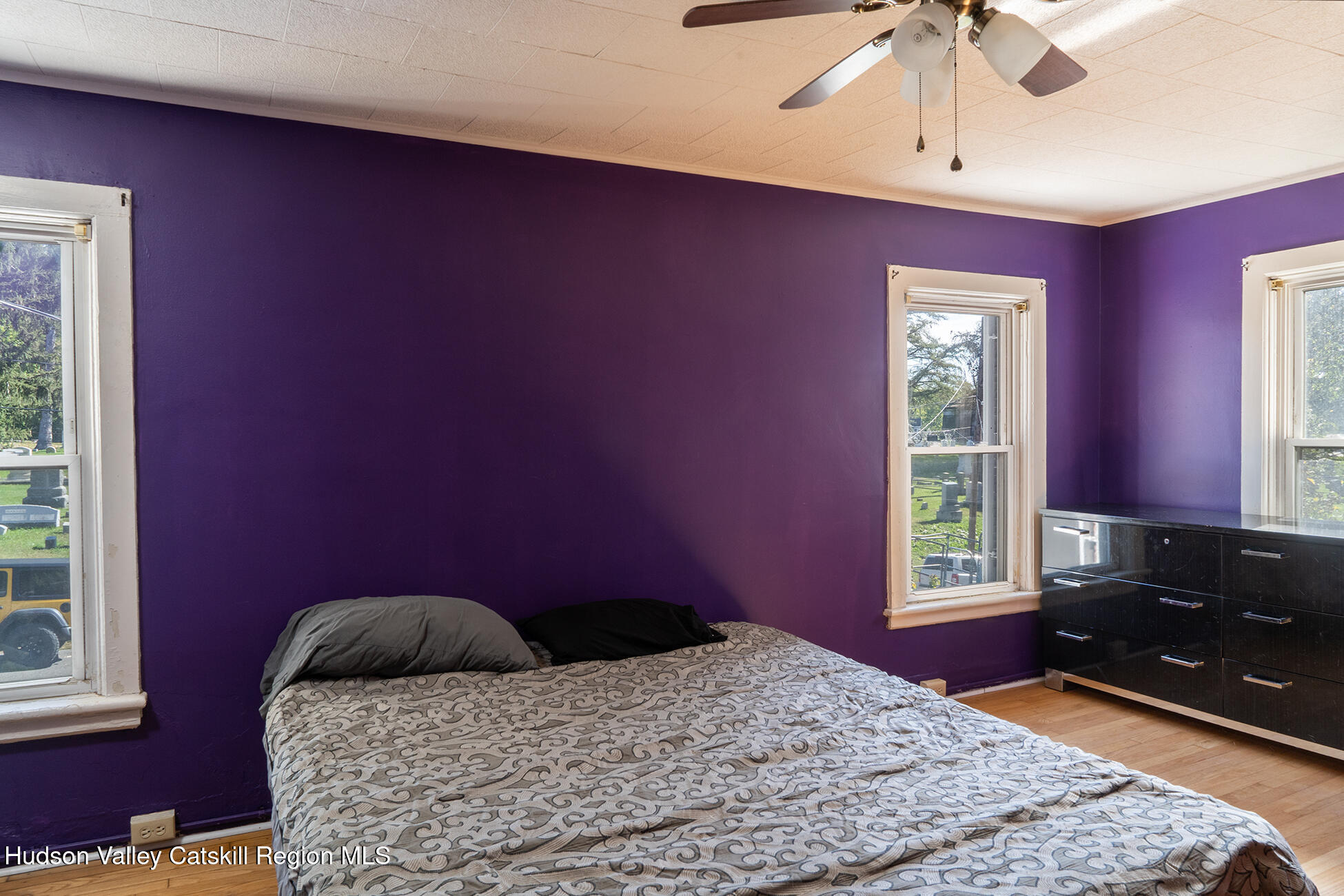 71 New Street Catskill, NY 12414 - Photo 8 of 13 a bedroom with a bed and a window