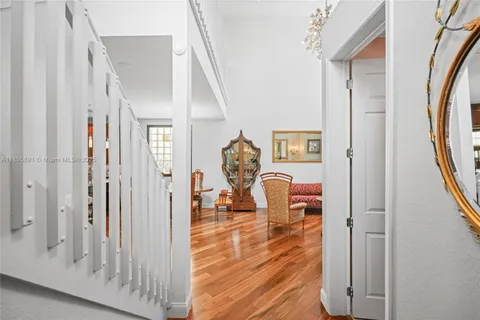 an aerial view of residential houses with city view