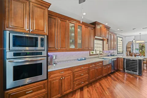 an aerial view of a house with outdoor space
