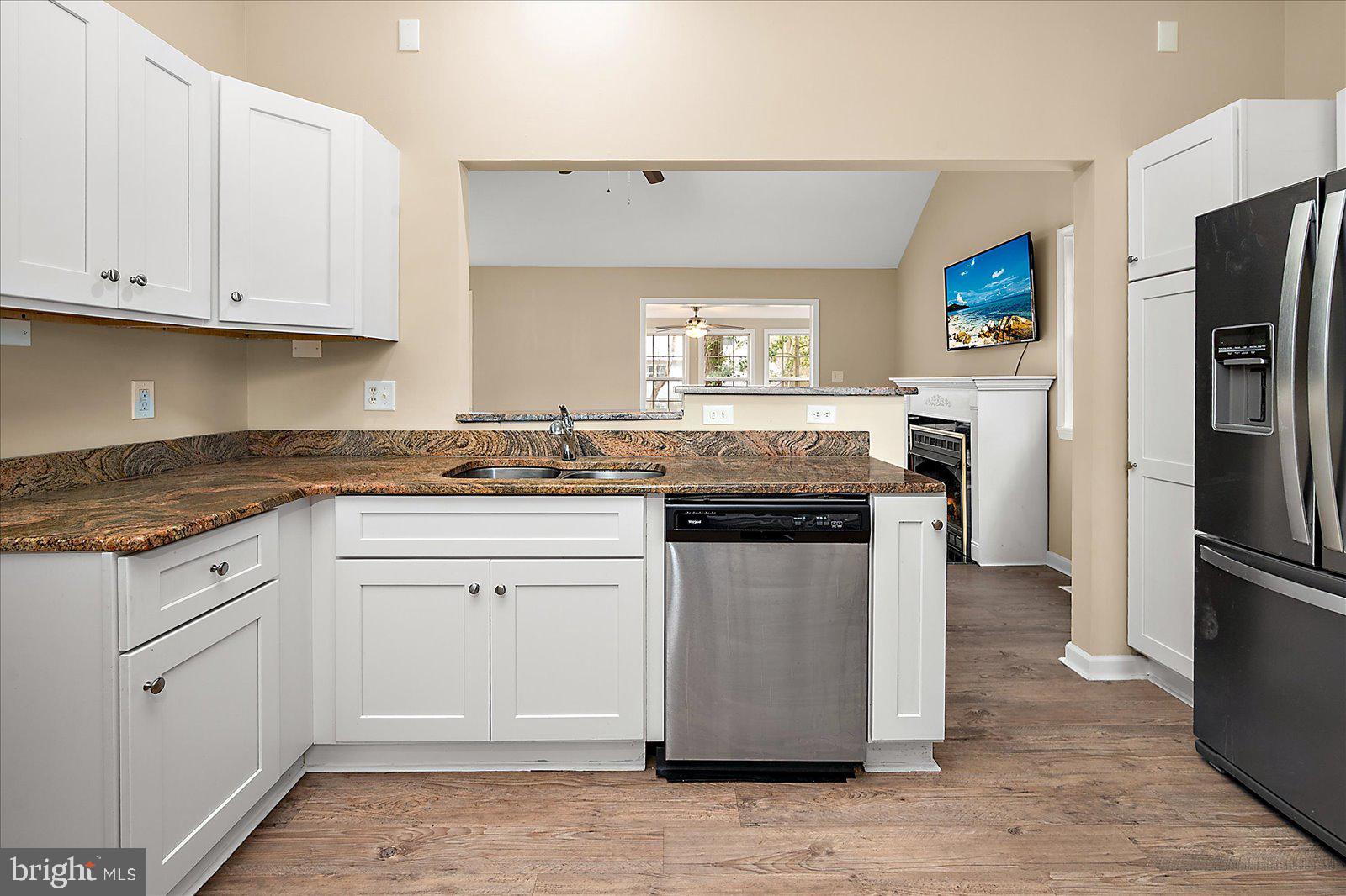 37 Watertown Road Ocean Pines, MD 21811 - Photo 15 of 86 a kitchen with stainless steel appliances granite countertop a refrigerator sink and stove