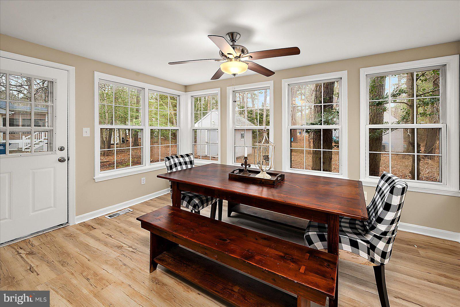 37 Watertown Road Ocean Pines, MD 21811 - Photo 18 of 86 a view of a dining room with furniture window and wooden floor