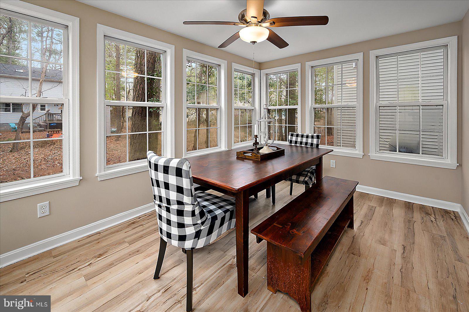 37 Watertown Road Ocean Pines, MD 21811 - Photo 19 of 86 a dining room with furniture windows and wooden floor
