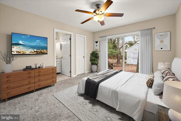 an aerial view of residential houses with outdoor space and swimming pool