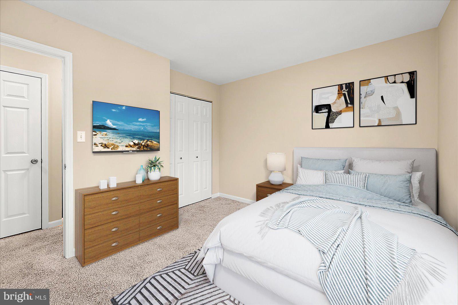 37 Watertown Road Ocean Pines, MD 21811 - Photo 33 of 86 a bedroom with a bed and a mirror