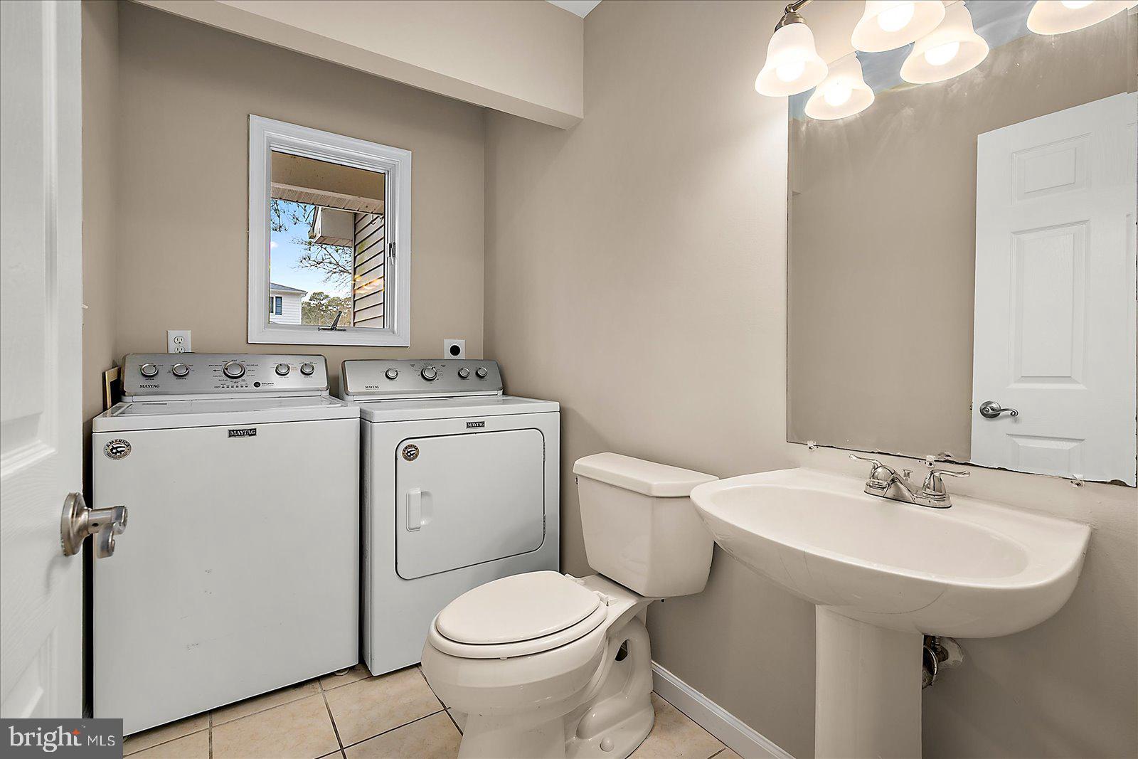 37 Watertown Road Ocean Pines, MD 21811 - Photo 36 of 86 a bathroom with a sink toilet and a mirror