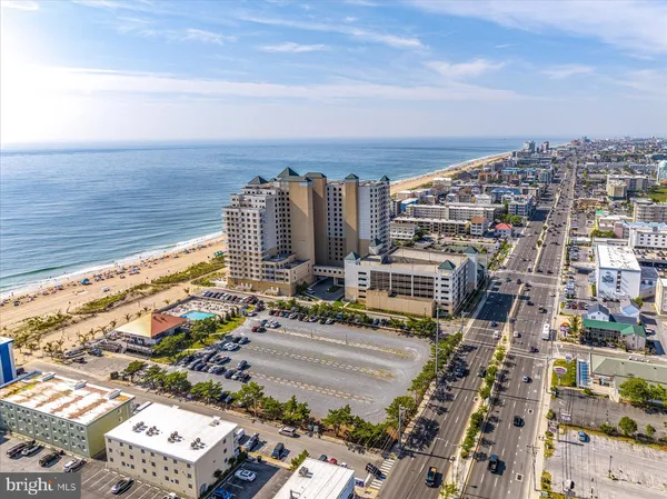 an aerial view of a house with a swimming pool