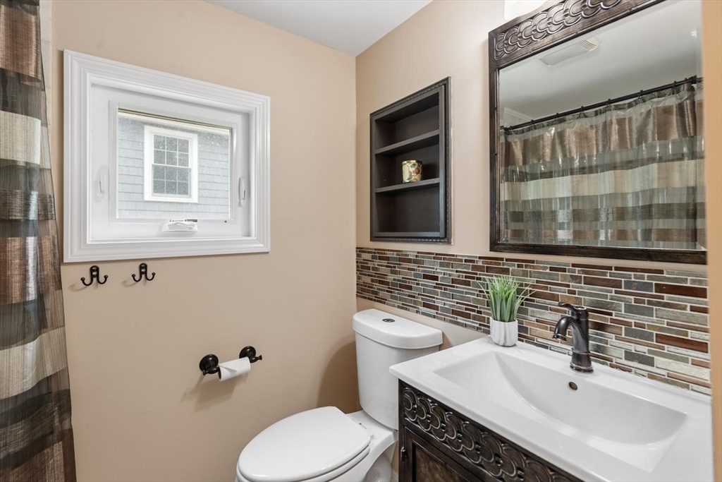 14 Church Street Westwood, MA 02090 - Photo 27 of 35 a bathroom with a sink toilet and shower