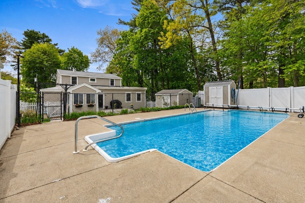 14 Church Street Westwood, MA 02090 - Photo 31 of 35 a view of a swimming pool with a patio