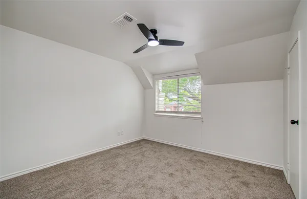 a view of house with a yard