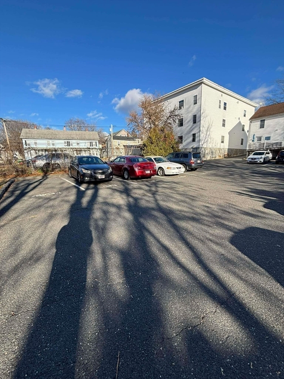 48 North Street, Unit 9 Gilbertville, MA 01031 - Photo 12 of 12 a view of parking space with parked cars