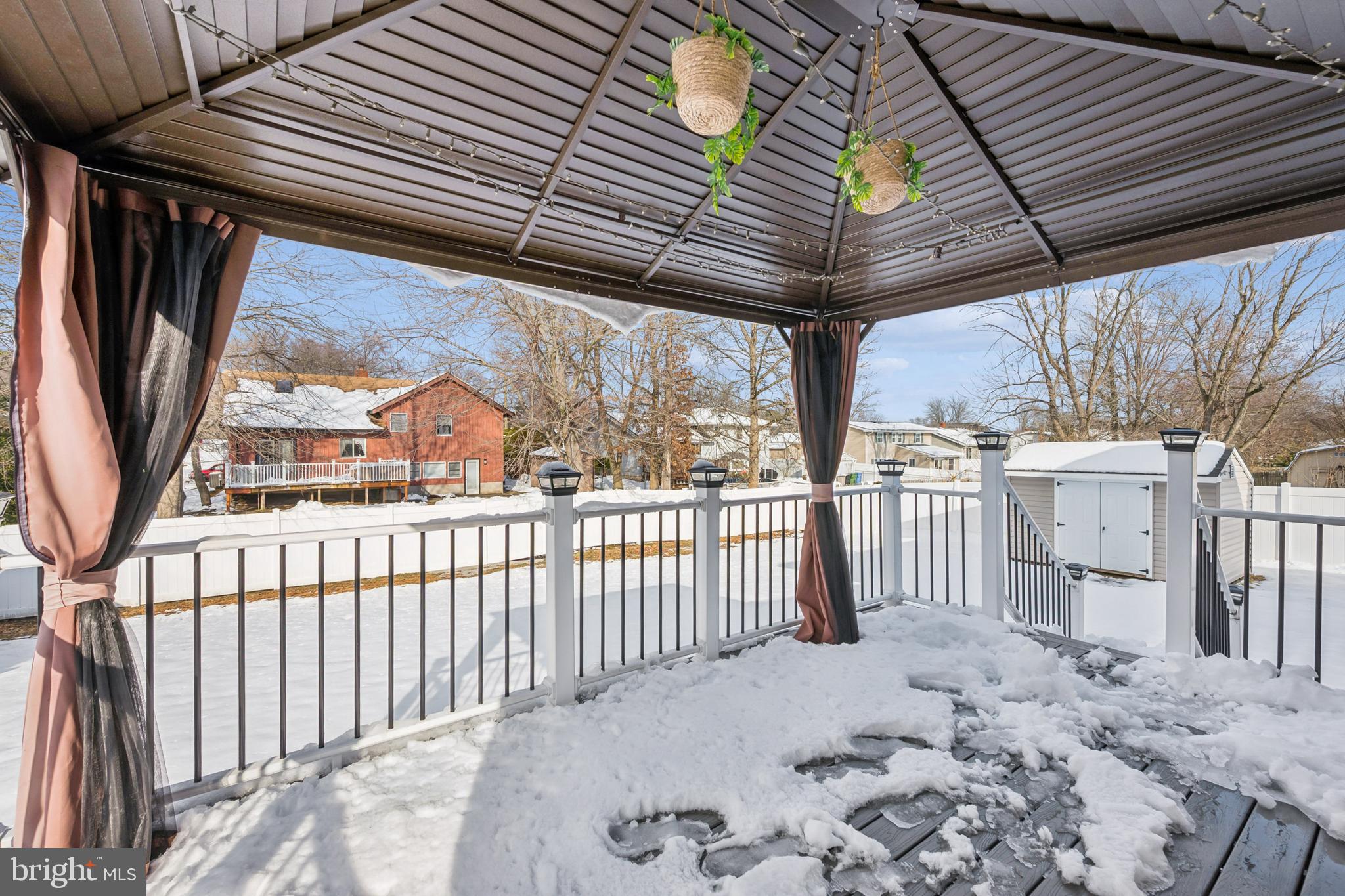 205 Avon Road Cherry Hill, NJ 08034 - Photo 20 of 25 a view of a backyard with wooden fence