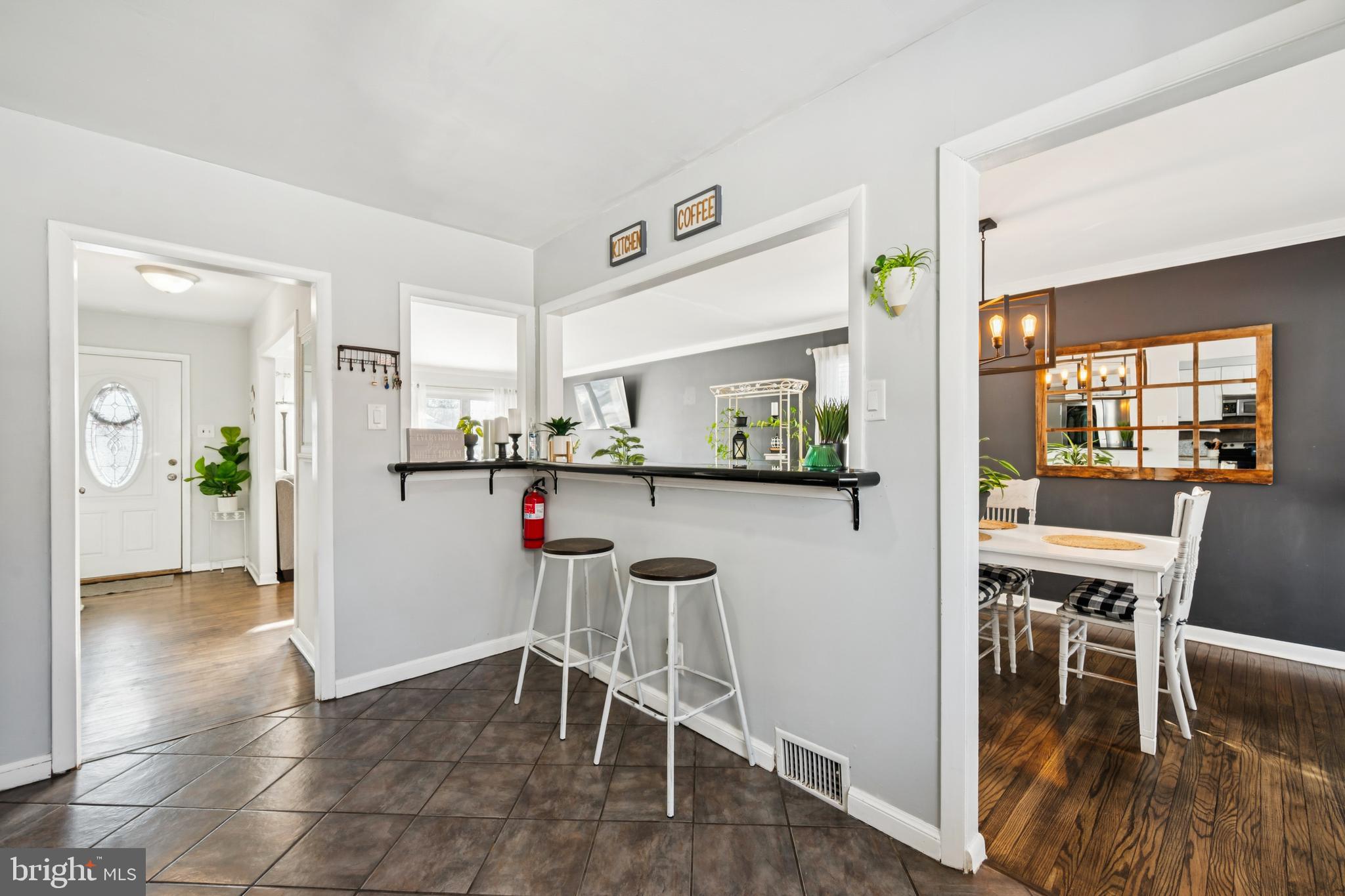 205 Avon Road Cherry Hill, NJ 08034 - Photo 23 of 25 a dining room with furniture and wooden floor