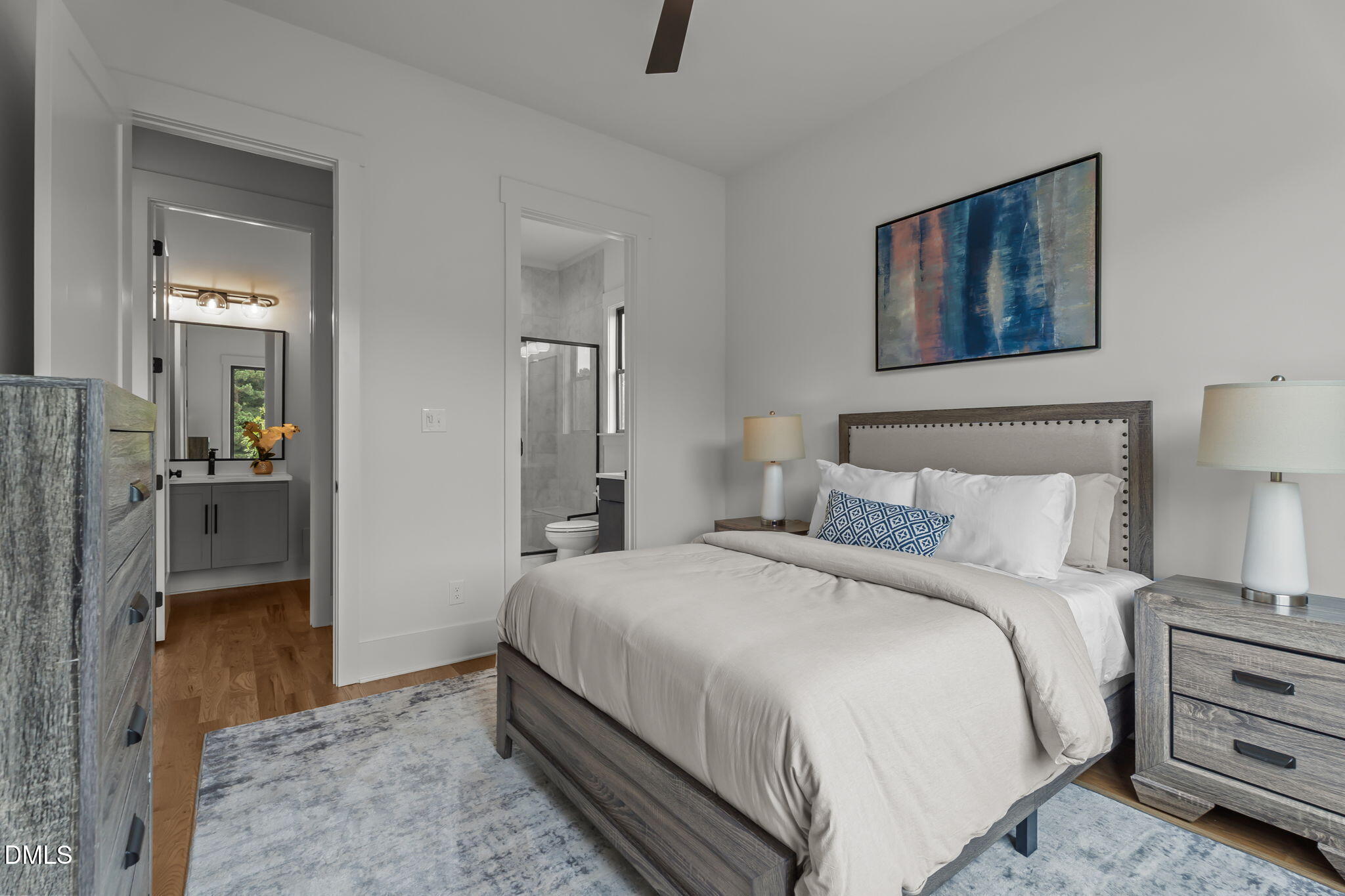 200 Broadleaf Lane Louisburg, NC 27549 - Photo 25 of 57 a bedroom with a bed and a view of bathroom