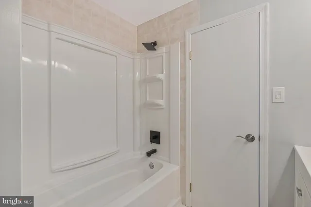a bathroom with a bathtub