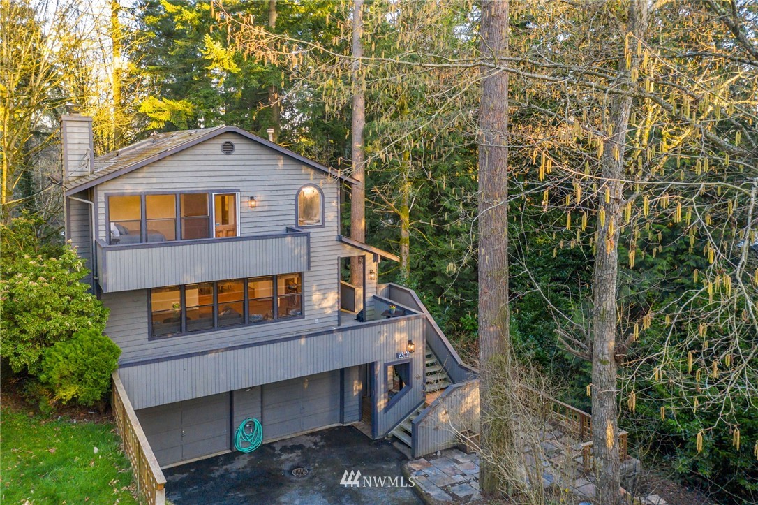 23511 Meridian Avenue South Bothell, WA 98021 - Photo 1 of 40 a front view of a house with a yard