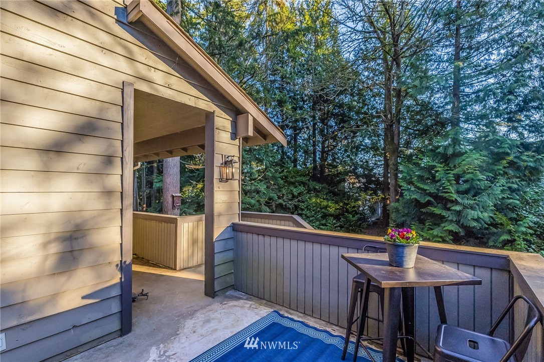 23511 Meridian Avenue South Bothell, WA 98021 - Photo 20 of 40 a view of balcony with wooden floor and outdoor seating