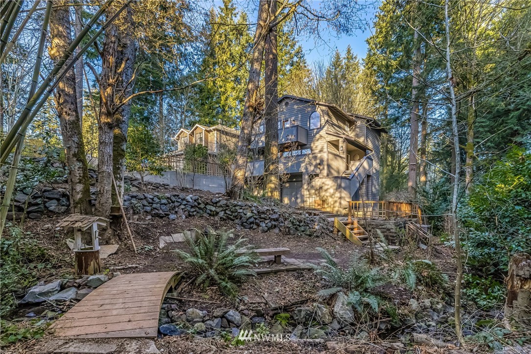 23511 Meridian Avenue South Bothell, WA 98021 - Photo 3 of 40 a view of a house with a yard