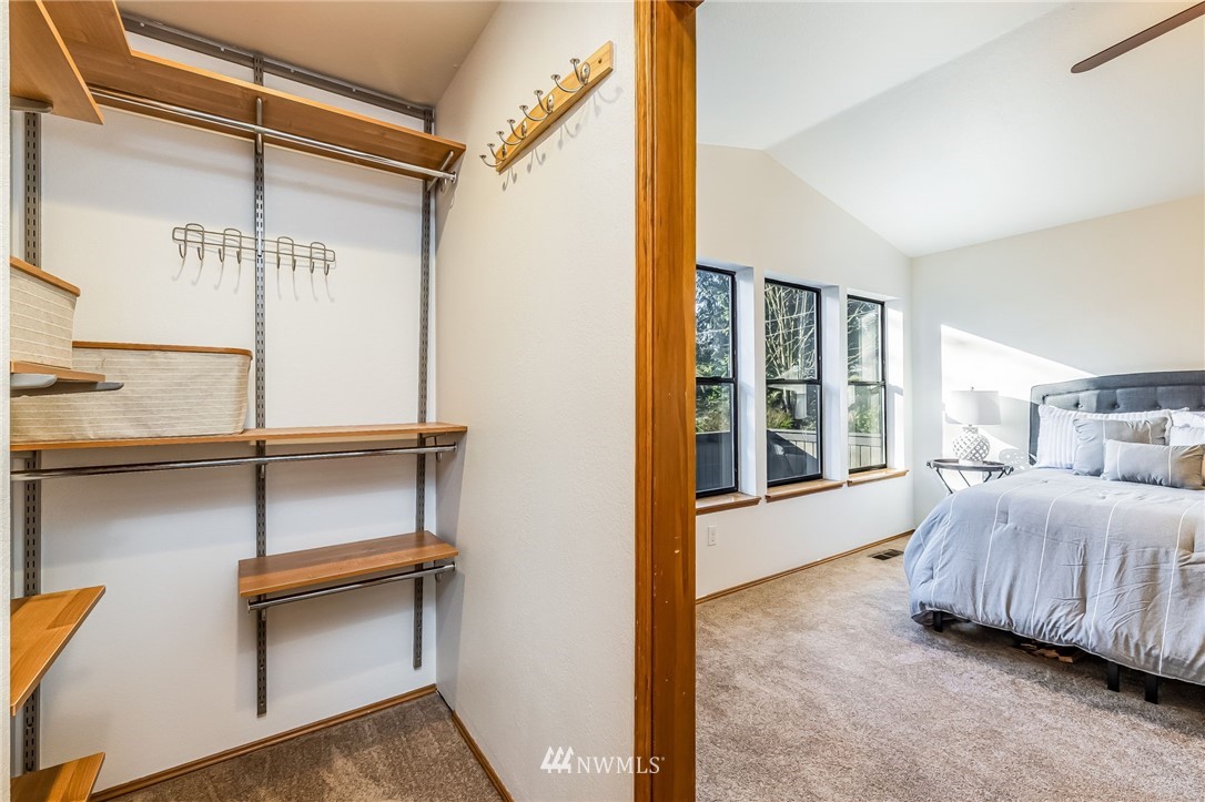 23511 Meridian Avenue South Bothell, WA 98021 - Photo 26 of 40 a bedroom with a bed and a window