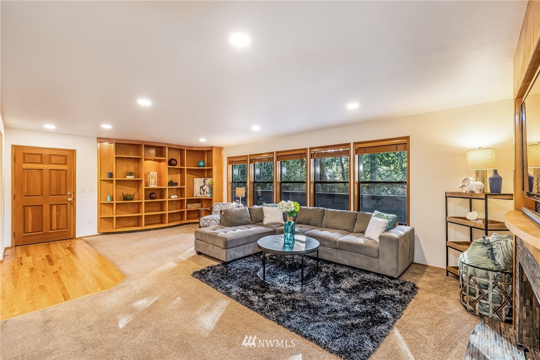 23511 Meridian Avenue South Bothell, WA 98021 - Photo 10 of 40 a living room with furniture and a large window
